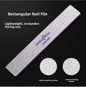 Detail view of 100 and 180 grit textures on double-sided professional nail file