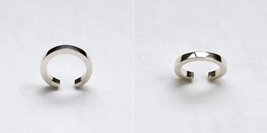 Detail view of polished S925 sterling silver square band ring with minimalist open design