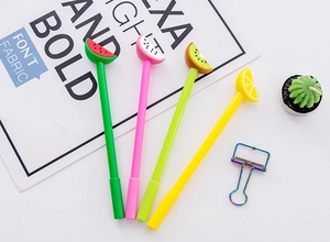 Close-up of fruit-shaped gel pens featuring watermelon, kiwi, lemon and dragon fruit designs