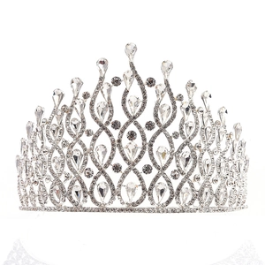 Detailed close-up of a silver bridal crown featuring luxury alloy rhinestones and crystals