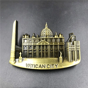 Close-up of 3D bronze metal Vatican City souvenir magnet with St. Peter's Basilica