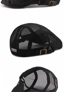 Detail view of breathable mesh beret featuring adjustable metal buckle and S-logo plate