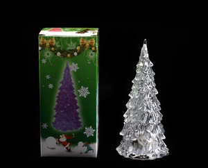 Detailed view of a crystal Christmas tree night light with its green gift box packaging