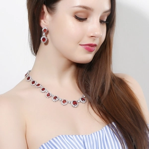 Parure de bijoux de mariée en argent avec pierres rouges ovales et cristaux de zircon