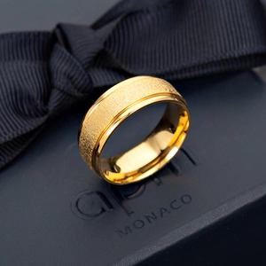 Gold plated stainless steel couple ring with frosted center and polished edges on gift box