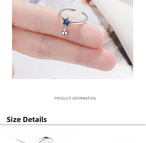 Close-up of S925 sterling silver ring featuring a blue star charm and adjustable band