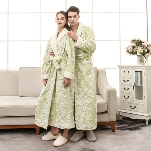 Thick green flannel bathrobe with jacquard pattern for couples shown in home setting