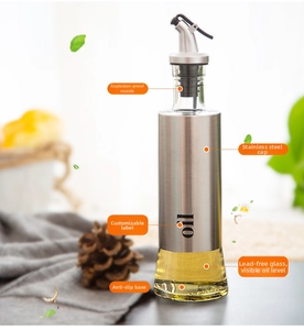 Detail of oil bottle with stainless steel shell, lead-free glass base and leak-proof spout