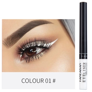 Close up of white liquid eyeliner with glitter effect, showing smooth application and fine brush tip.
