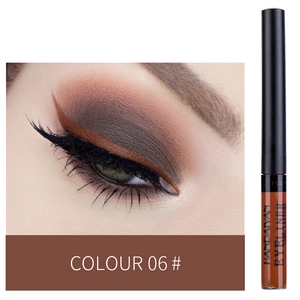 Close-up shot of brown eyeliner makeup application and product bottle detail display.