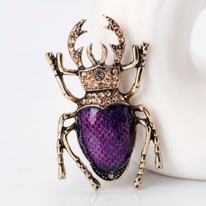 Vintage beetle brooch with purple enamel and champagne crystals on gold alloy