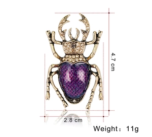Detailed size parameters for the vintage beetle brooch with dimensions 4.7cm by 2.8cm