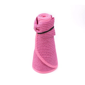 Foldable rose pink straw sun hat for women featuring a compact roll-up beach design