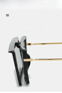 Detail view of lightweight black square frame sunglasses with sleek gold metal temples