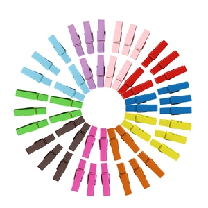 Colorful 3.5cm wooden clips in a circular arrangement on a clean white background