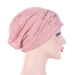 Pink lace thin breathable beanie with rhinestones for women shown on a model side view