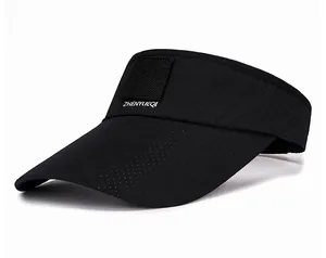 Detail of black sports visor showing breathable fabric and side profile view
