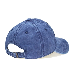 Detail view of washed cotton kids baseball cap with adjustable metal buckle at back