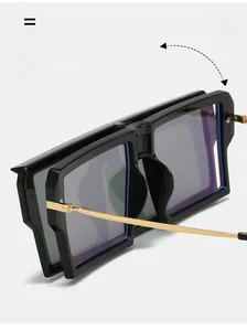Close-up of high-strength metal hinge on foldable square frame sunglasses with gold temples