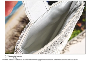 Detailed view of the soft interior lining and spacious compartment of the rhinestone bag