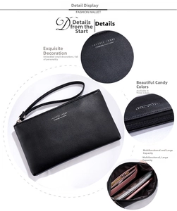 Detail view of black textured leather wallet featuring card slots and a metal zipper