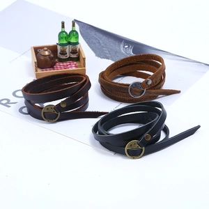 Retro multi-layer cowhide bracelets in black and brown with bronze buckles on white background