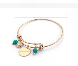 Detailed size chart for golden bracelet with turquoise bead and Mother's Day heart pendant