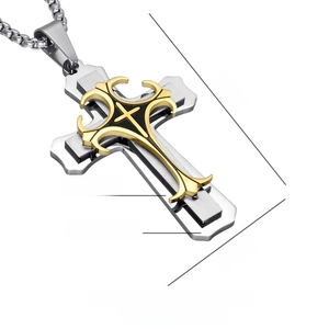 Macro detail of triple layer stainless steel cross pendant showing size 5.7cm by 3.6cm
