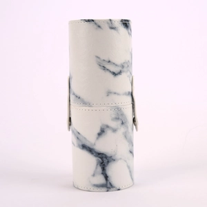 Detail of white marble pattern PU leather makeup brush holder with secure snap button