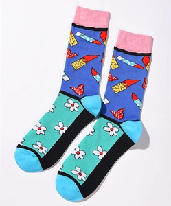 Detail of colorful crew socks featuring trendy lipstick dots and white daisy floral patterns