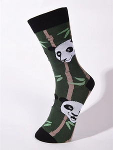 Detail of dark green cotton socks featuring cute panda and bamboo patterns with black accents