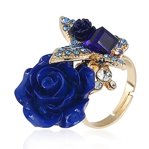 Bohemian gold-tone ring featuring blue rose, square gemstone and sparkling crystals