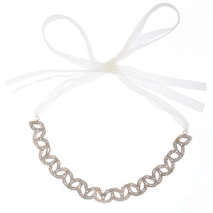 Detailed view of silver rhinestone leaf headband with white chiffon ribbon tie for weddings
