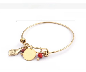 Detail of 18K gold plated adjustable bangle with heart and hand charms, 64mm diameter