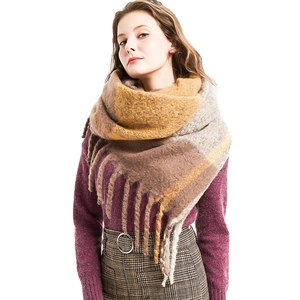 Thick oversized checkered tassel scarf in yellow and brown colors for winter