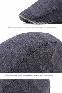 Detailed close-up of dark blue plaid cotton linen beret with reinforced brim and fine stitching