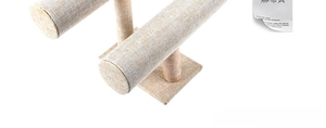 Detail of double-tier T-bar jewelry stand with beige linen texture for bracelets and watches