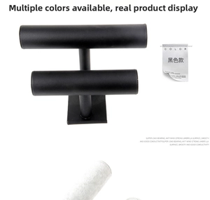 Close-up of double-tier black velvet T-bar display stand for bracelets and watches