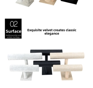 Close-up of T-bar jewelry display stands in velvet, leather, and linen materials