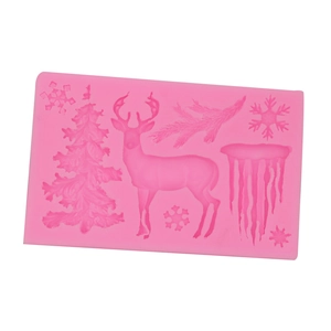 Pink silicone Christmas mold with reindeer, snowflakes and tree for DIY baking