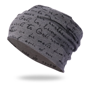 Gray slouchy beanie with artistic script print made of soft cotton knit fabric