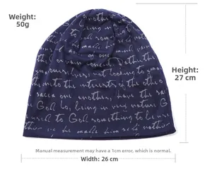 Flat lay of a navy knit beanie with printed text showing 27cm height and 26cm width specs