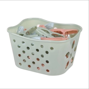 30-piece windproof clothes pins set in mint and pink storage basket for drying laundry
