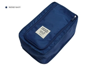 Detail of Indigo Navy waterproof travel shoe bag with handle and zipper closure