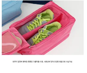 Detail of rose pink waterproof shoe bag featuring breathable mesh and inner divider
