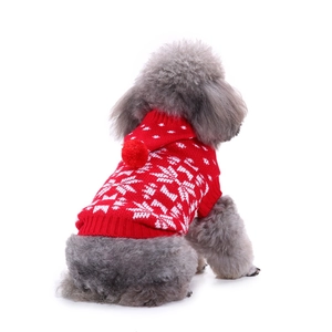 Red knit Christmas dog sweater with white snowflake pattern and hood on grey poodle