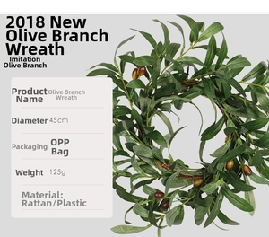 Detailed view of artificial olive leaf wreath with 45cm diameter on natural rattan base