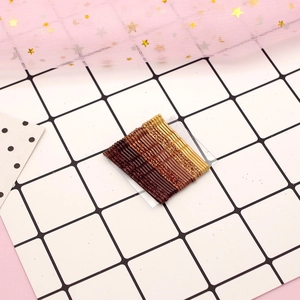 Sparkly Korean style glitter bobby pins set in gold and brown shades for girls