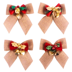 Christmas bow ornaments with bells and berries for tree and wreath decorations