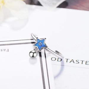 Minimalist S925 silver open ring with blue star charm and evil eye detail